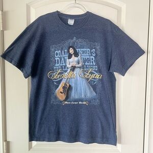 Vintage-style Loretta Lynn t-shirt featuring a graphic and Coal Miner's Daughter